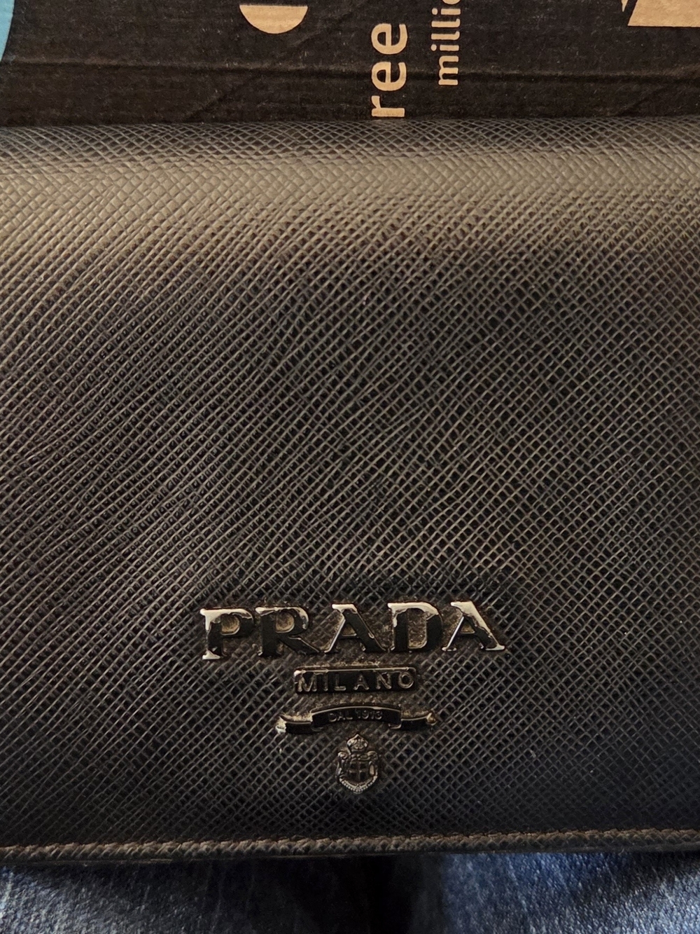 Prada Black Saffiano Leather Unisex Bi-Fold Wallet with Silver Logo